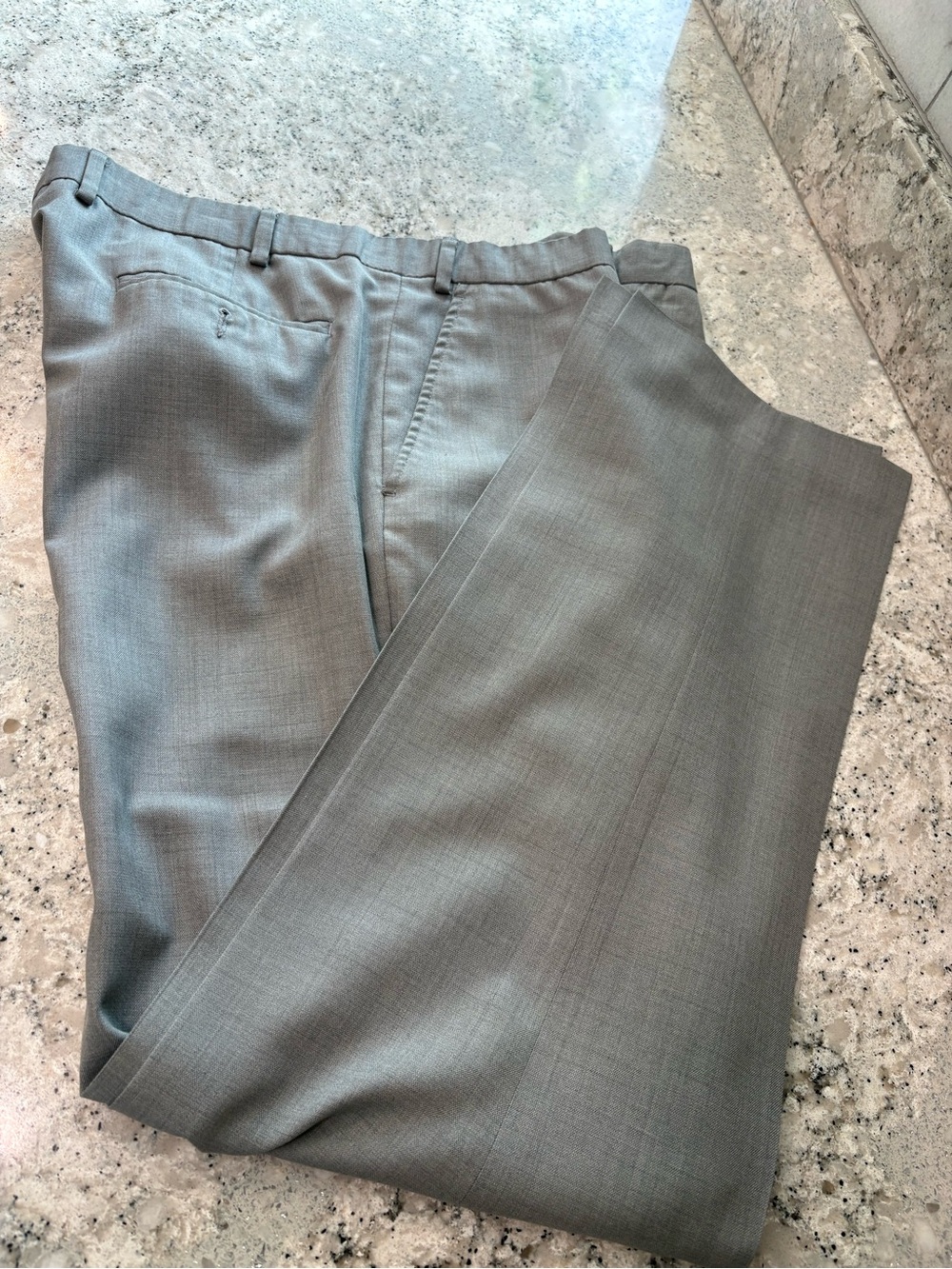 38 w/32L  small tear near night front pocket from dry cleaning .